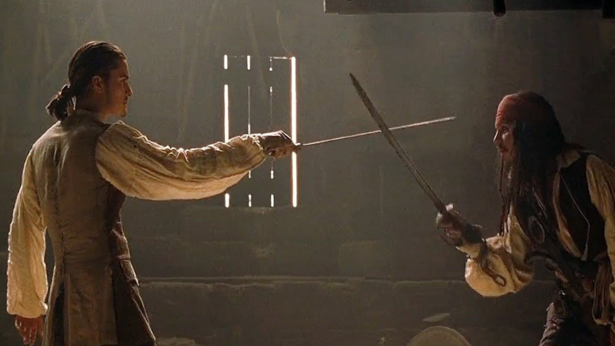 Pirates of the Caribbean - image of Will Turner and Jack Sparrow in a sword fight